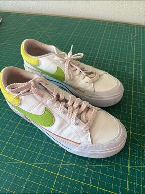 Nike White Sneakers with Lime Green Swoosh and Yellow Heel